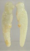 TWO CHINESE CARVED JADE PARROTS, 9.5cm.