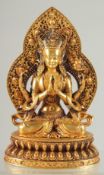 A FINE TIBETAN GILDED ALLOY BUDDHA, 17cm high.