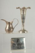 A COLLECTION OF THREE IRAQI NIELLO SILVER ITEMS: a vase (signed), milk jug, and a cigarette case, (