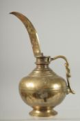 A FINE 18TH-19TH CENTURY SOUTH INDIAN OR SRI LANKAN BRASS OIL POURING EWER, 25cm high.