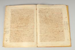 A PERSIAN MEDICAL MANUSCRIPT, in a leather overlaid binding, 30.5cm x 23.5cm.
