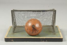 A RARE PIECE OF FOOTBALL MEMORABILIA, a goal with a football. 2.75ins diameter as a clock. Goal