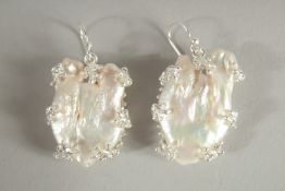 A PAIR OF SILVER BAROQUE PEARL EARRINGS.