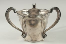 A GOOD LARGE ART NOUVEAU SILVER TYG engraved with a crest.