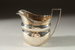 A GEORGE III MILK JUG London 1803.