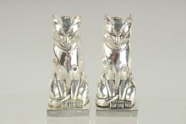A PAIR OF ART DECO STYLE SILVER PLATED CAT SALT AND PEPPERS. 3ins high.