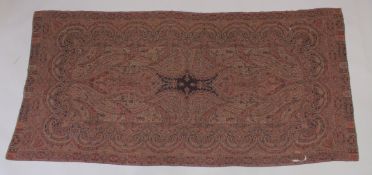 A FINE KASHMIRI SHAWL 84ins x 40ins (a few holes)