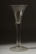 A LARGE PLAIN GEORGIAN GLASS with tapering bowl. 7.25ins high.