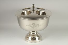 A CIRCULAR FOUR BOTTLE MOET & CHANDON ICE BUCKET.
