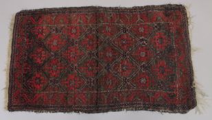 A BELOUCH PERSIAN RUG. 43ins x 24ins.
