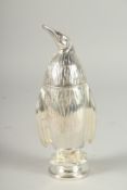 A SILVER PLATED PENGUIN SUGAR SIFTER. 7ins high.