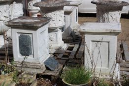 A GOOD PAIR OF ITALIAN WHITE MARBLE STANDS 2ft 7ins high.