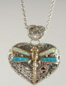 A SILVER GOLD PLATED OPAL DRAGONFLY LOCKET AND CHAIN.