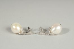 A PAIR OF SILVER BAROQUE PEARL DROP EARRINGS.