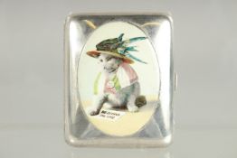 A PLAIN SILVER CIGARETTE CASE with an oval of a suffragette cat. 3.25ins x 2.5ins.