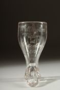 A SMALL GEORGIAN GLASS shaped as a boot, engraved 