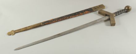 A GERMAN SWORD in a leather scabbard with brass pommel. Inventory No. 10.286. 41ins long.
