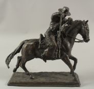 J. GOODE A BRONZE MATADOR ON HORSEBACK. Signed, 10ins high.