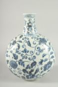 A CHINESE BLUE AND WHITE PORCELAIN MOON FLASK decorated with flower heads and scrolling vine. 31cm