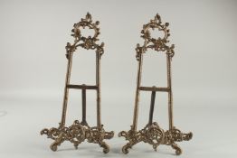 A PAIR OF BRASS PICTURE EASELS. 16ins high.