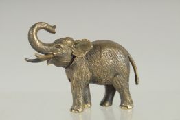 A NOVELTY BRASS ELEPHANT VESTA. 2.5ins long.