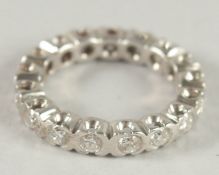 A GOOD 18CT WHITE GOLD DIAMOND FULL ETERNITY RING.