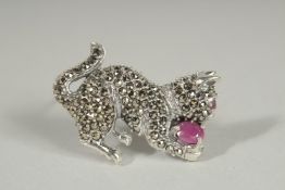 A SILVER MARCASITE PLAYFUL CAT MASCOT.