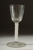 A GEORGIAN GLASS with plain bowl and white twist stem. 5.5ins high.