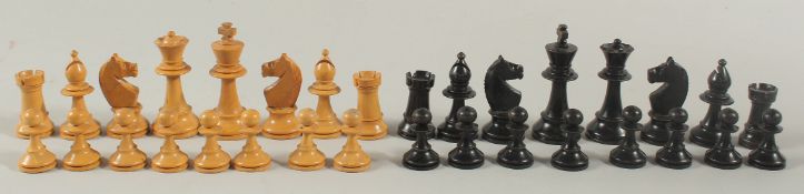 A SET OF BLACK AND WHITE BOXWOOD CHEST PIECES.