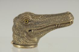 A NOVELTY BRASS CROCODILE VESTA CASE. 2.5ins long.