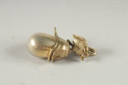 A RUSSIAN SILVER EGG AND HELMET PENDANT.