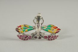A SILVER RUBY SET PLIQUE ENAMEL ART DECO STYLE, DRAGON FLY RING.