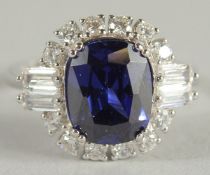 A SILVER SAPPHIRE C Z RING.