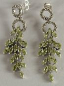 A PAIR OF SILVER, PERIDOT AND MARCASITE LONG EARRINGS.