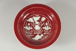 A CHINESE SANG DE BEOUF GLAZED PEDESTALL BOWL. 8ins diameter.