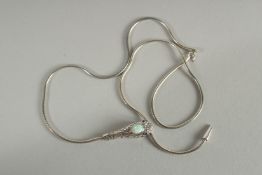 A SILVER OPAL AND RUBY SNAIL NECKLACE.