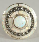 A SILVER OPAL AND MARCASITE DECO STYLE TARGET RING.
