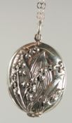 A SILVER LILY OF THE VALLEY LOCKET AND CHAIN.