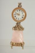 A ROSE QUARTZ SILVER MOUNTED CLOCK. 6ins.