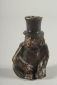 A JAPANESEE BRONZE GORILLA SNUFF BOTTLE AND STOPPER. 2.5ins high.