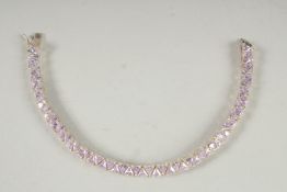 A SILVER GILT & CZ BRACELET.