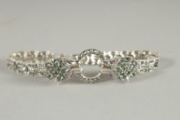 A SILVER EMERALD MARCASITE PANTHER BRACELET.