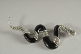 A GOOD SILVER BLACK ENAMEL SNAKE BRACELET.