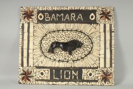 A BOMARD BONE AND EBONY PANEL, LION. 20ins x 24ins.