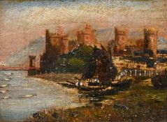 A view of Conway Castle with moored sailing boats, oil on panel, 3.5