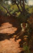 John White (1851-1933) British, A young boy lying against a bank on a pathway beneath trees in the