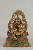 A COLD PAINTED BRONZE TIBETAN DEITY, 23cm high.