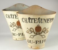 A PAIR OF WHITE CHATEAU NEUF DU PAPE GRAPE CARRIERS. 24ins high.