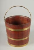 A BRASS BANDED WOODEN BUCKET. 12ins high.
