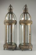A LARGE PAIR OF COPPER CIRCULAR LANTERNS. 30ins high.